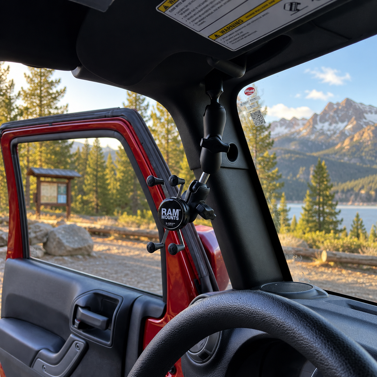 FireCrateUSA 2007-2018 Jeep Wrangler JK JKU A-pillar 1-inch RAM-compatible phone and radio mount installed in Jeep interior